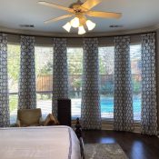 Custom draperies in a bedroom
